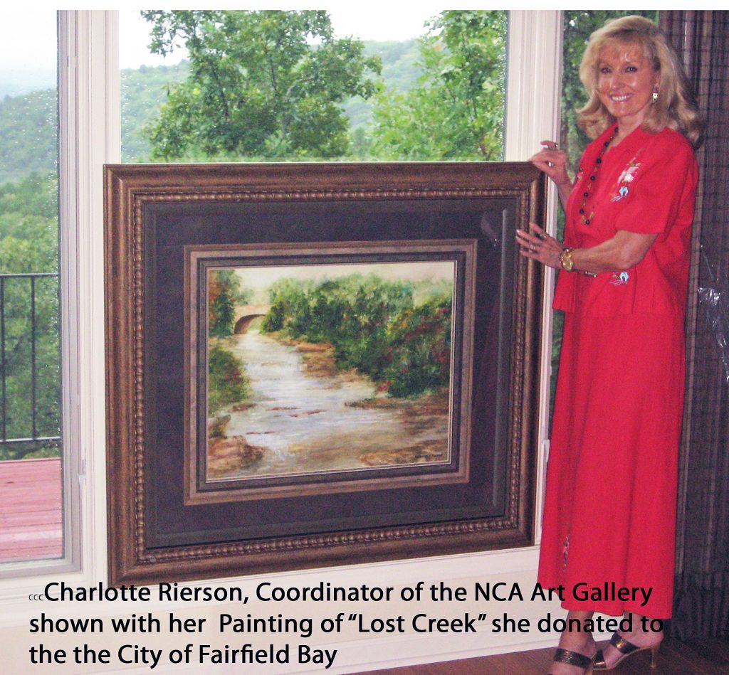 Charlotte with her painting of Lost Creek